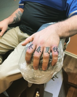 Whole Piercing Tattoo