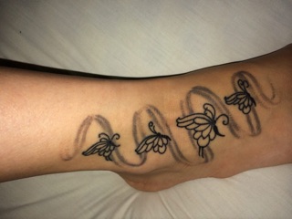 Solid Gold Tattoo photo 8