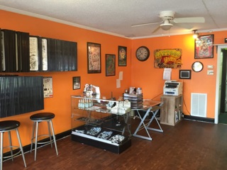 The Gay Penguin Piercing and Tattoo