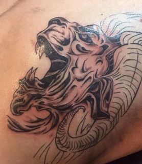 Ink and Ashes Tatoo and Art Studio