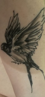 Nomad Tattoo