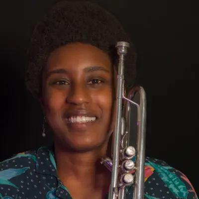 Listen to Trumpet Wom', watch music videos, read bio, see tour dates & more!