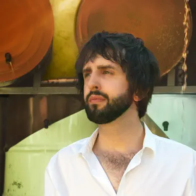 Listen to Dan Caine, watch music videos, read bio, see tour dates & more!
