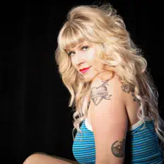 Listen to Caitlin Cannon, watch music videos, read bio, see tour dates & more!