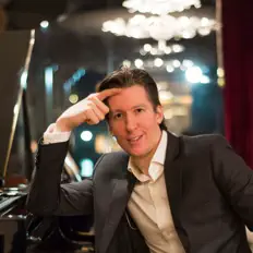 Listen to The Pianoman, watch music videos, read bio, see tour dates & more!