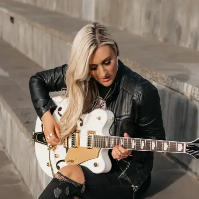 Listen to Megan Woods, watch music videos, read bio, see tour dates & more!