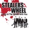 Stuck In the Middle With You - Stealers Wheel lyrics