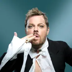 Listen to Eddie Izzard, watch music videos, read bio, see tour dates & more!