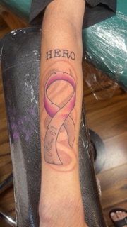 Purple Orchid Tattoo and Piercing