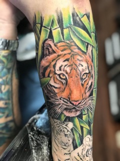 Inflictions Tattoos and Piercings