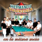 En La Misma Mesa