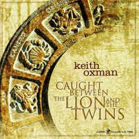 Caught Between the Lion and the Twins - Keith Oxman