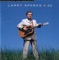 1-800-Do-U-Care (feat. Rhonda Vincent) - Larry Sparks lyrics