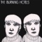 Stuck In the Middle - The Burning Hotels lyrics