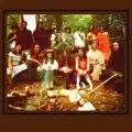 Old Black Hat With a Dandelion Flower