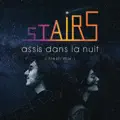 Assis dans la nuit