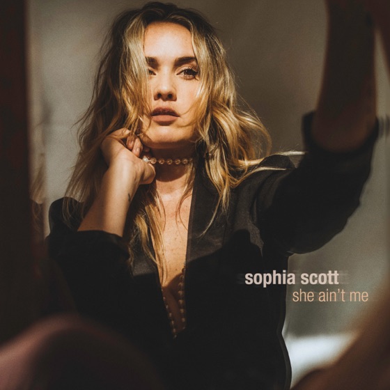Cover artwork for She Ain't Me