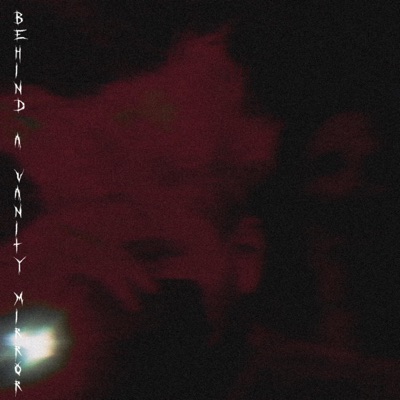 Behind a Vanity Mirror