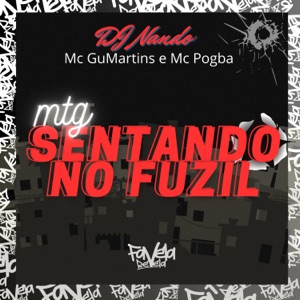 MTG sentando no fuzil