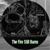 The fire still burns