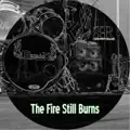 The fire still burns