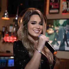 Julia Linhares: песни, клипы, биография, даты выступлений и многое другое.