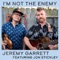 I'm Not the Enemy (feat. Jon Stickley) - Jeremy Garrett lyrics