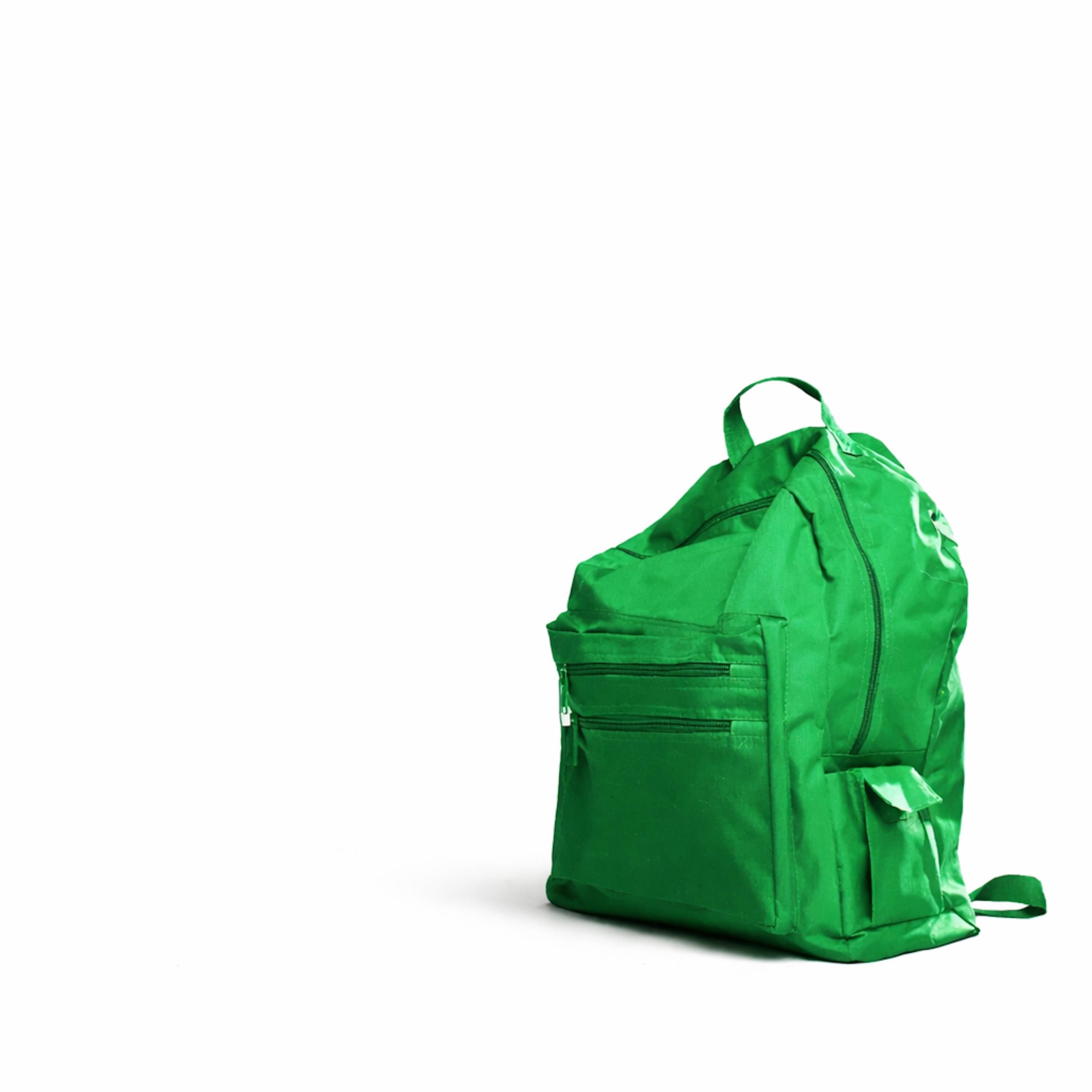 The Kid With The Green Backpack