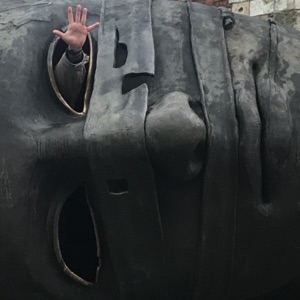 S.