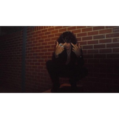 LIQUOR BOTTLES AND CIGARETTES