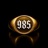 985