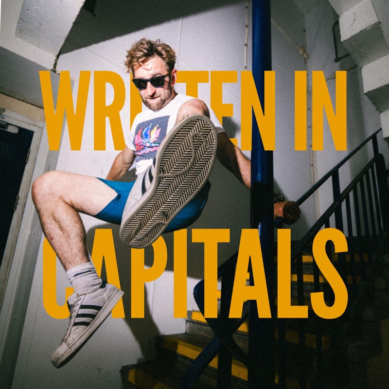 WRITTEN IN CAPITALS