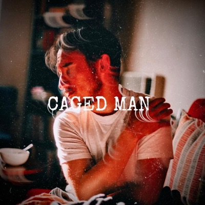 CAGED MAN