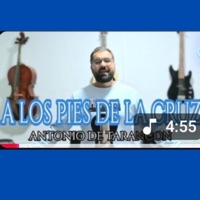 Alos pies de la cruz