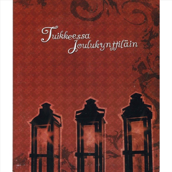 Tuikkeessa joulukynttiläin