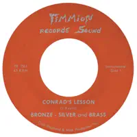 Conrad's Lesson — Bronze, Silver & Brass