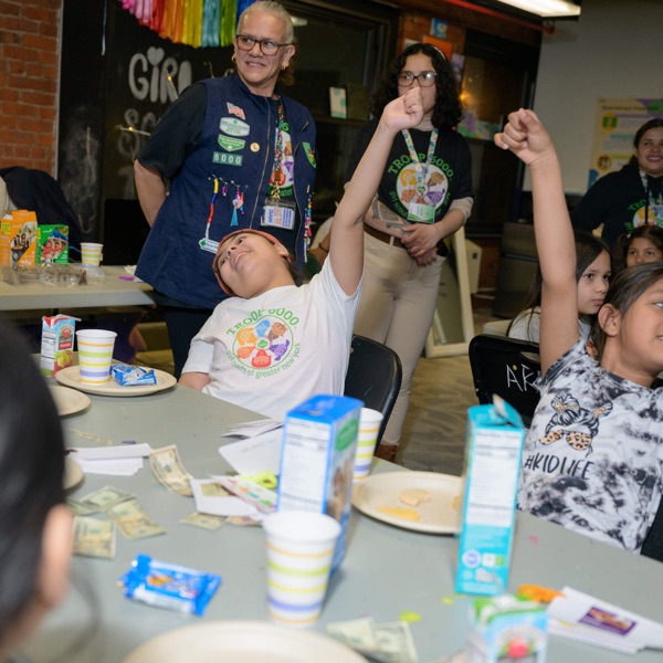 How this Girl Scout troop offers community to migrant children photo