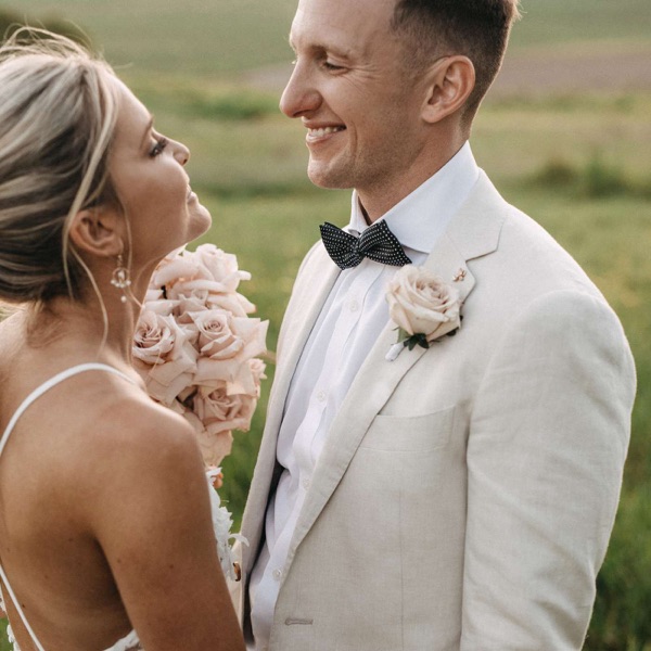 Buttonhole blooms and corsages for weddings - are they still a thing? photo