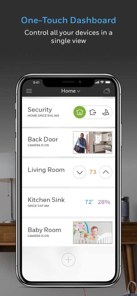 Resideo - Smart Home - Discover the comprehensive "One-Touch Dashboard" where users can manage various home sections, including security status and live camera feeds from rooms like the "Back Door" and "Baby Room".