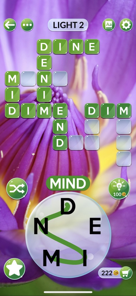 Wordscapes In Bloom - Users can experience the core gameplay, manipulating letters on the circular selection wheel to fill words into the crossword-style grid on a serene botanical backdrop.