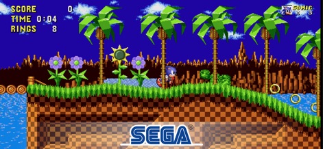 Sonic The Hedgehog Classic - Experience the iconic aesthetics of the lush Green Hill Zone landscape, showcasing Sonic traversing through vibrant terrain dotted with instantly recognizable palm trees.