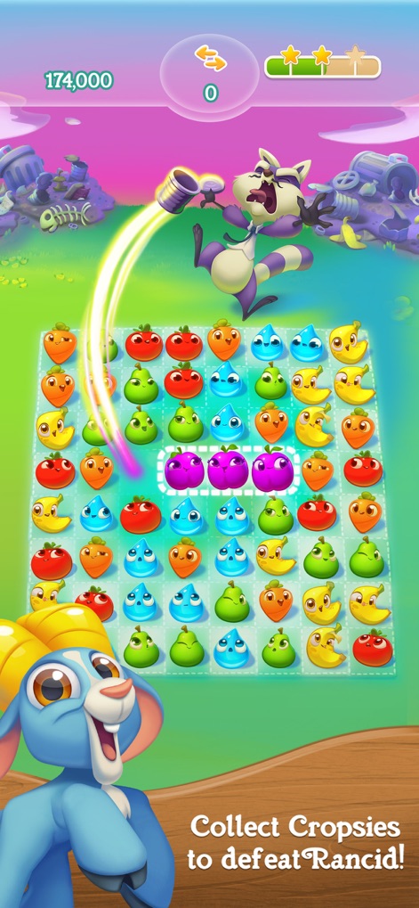 Farm Heroes Super Saga - This screenshot highlights the antagonist Rancid Raccoon, depicted in an animated pose, alongside the vibrant game board where players collect Cropsies to progress.