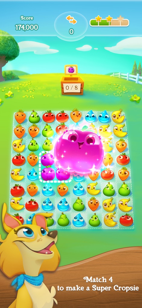 Farm Heroes Super Saga - See how matching four Cropsies creates a vibrant Super Cropsie, and observe the dog companion character at the bottom of the screen.