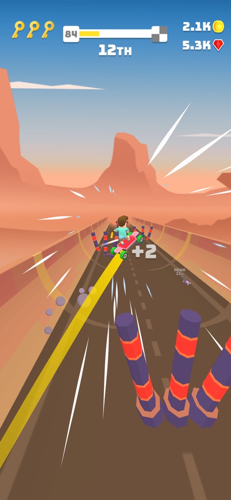 Turbo Stars - Epic Racing - Experience the vibrant desert landscapes and the strategic navigation around challenging red and orange obstacles during high-speed races.
