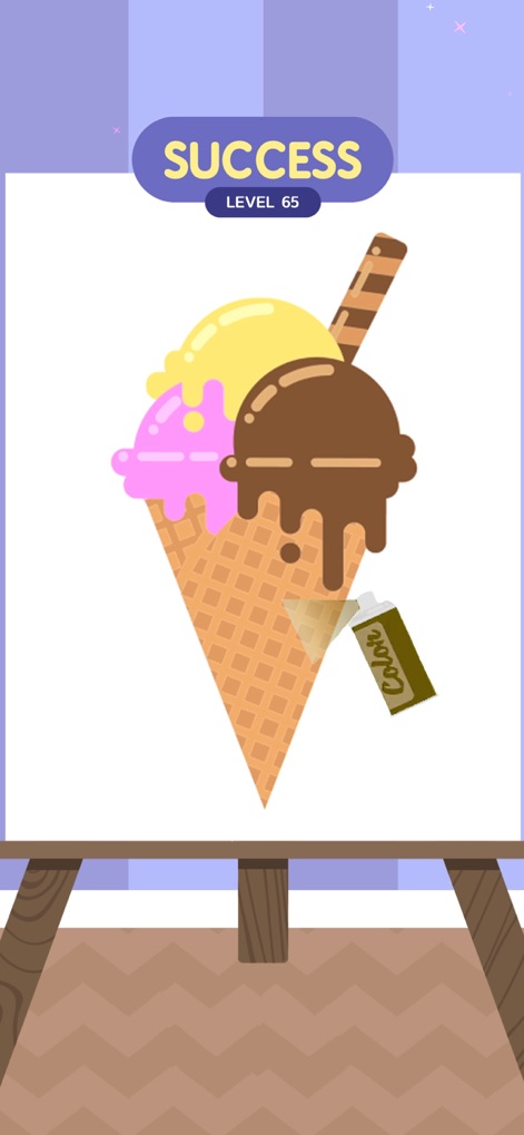 Stencil Art - Spray Masters - Users can celebrate achieving "SUCCESS" on "LEVEL 65" as they complete vibrant stencil art, like this delicious ice cream cone.