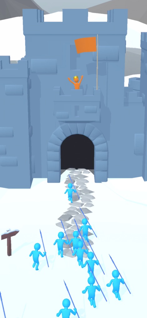 Big Battle 3D - The final objective is clear as the blue army advances toward a formidable castle entrance, set against a pristine snowy landscape, with a triumphant or defiant figure overlooking the scene.