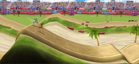 Mad Skills BMX 2: Bike Game - Users can experience high-stakes racing on a stadium circuit, complete with lush green track elements and crowded spectator stands in the background.
