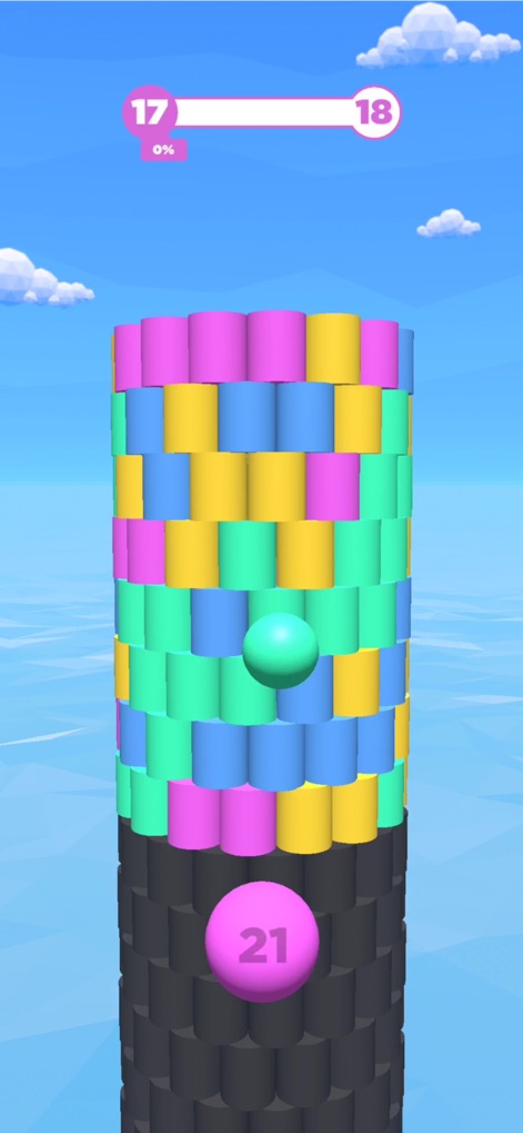 Tower Color - Hit and crash! - Esta captura resalta la variedad cromática de los bloques en la torre, ofreciendo a los usuarios una vista de la precisión del lanzamiento de la bola antes de impactar los elementos adecuados.