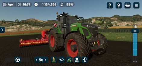 Farming Simulator 23 Mobile - La semina è un'operazione cruciale, rappresentata dal potente trattore Fendt di colore verde che traina un'attrezzatura per la semina e dal terreno arato meticolosamente preparato.
