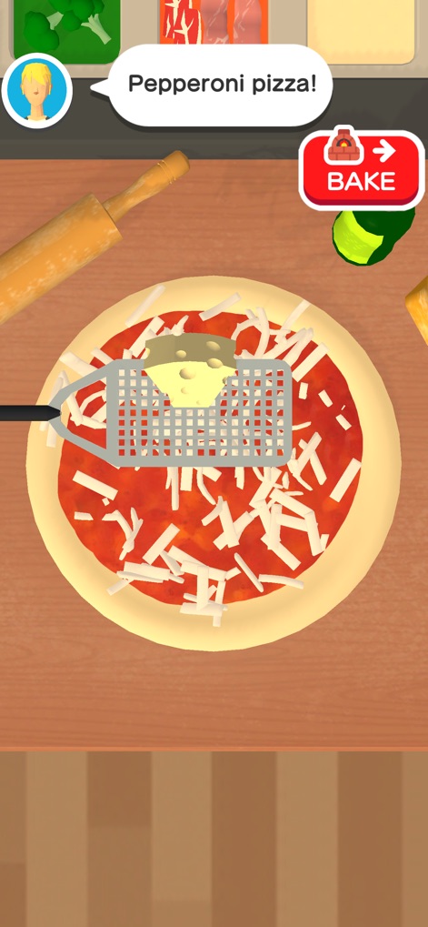 Pizzaiolo! - Users can skillfully grate cheese onto their pizza creations, responding to customer requests like "Pepperoni pizza!", then proceed to the "BAKE" option.